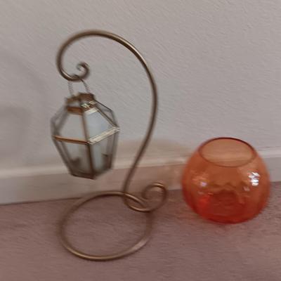 Metal display hanger with glass prism and vintage round orange glass bulb vase