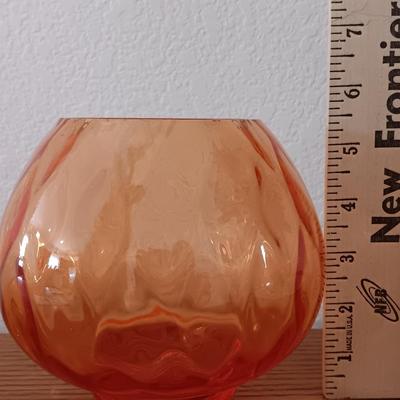 Metal display hanger with glass prism and vintage round orange glass bulb vase