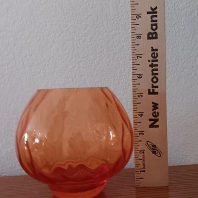 Metal display hanger with glass prism and vintage round orange glass bulb vase