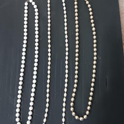 Five Beaded faux pearl necklaces.