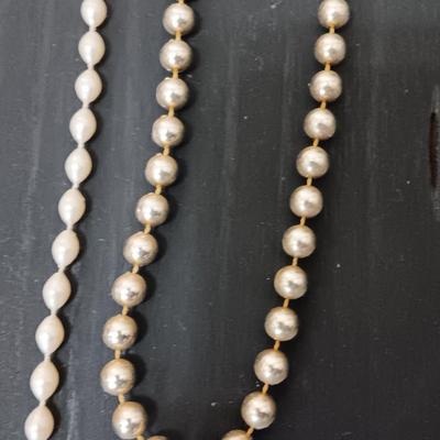 Five Beaded faux pearl necklaces.