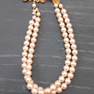 Three necklaces - two faux pearl beaded and one lightweight long chain.