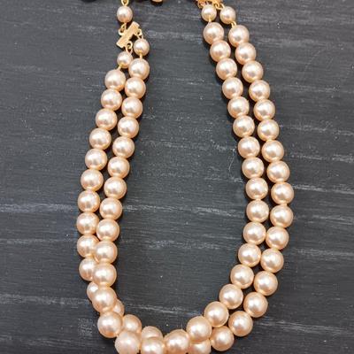 Three necklaces - two faux pearl beaded and one lightweight long chain.