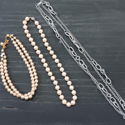 Three necklaces - two faux pearl beaded and one lightweight long chain.