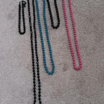 Five colorful beaded necklaces