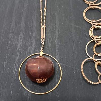 Two necklaces large ring chain and chain with chestnut