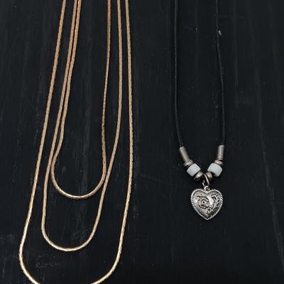 Gold toned 3 chain necklace and a Heart pendant necklace