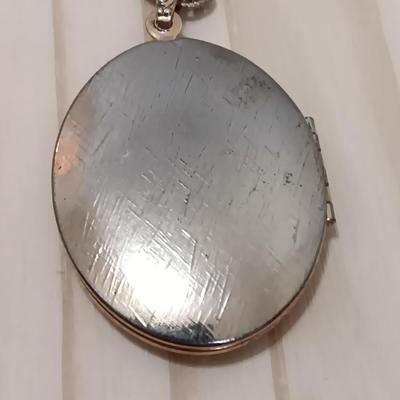 Vintage pendant necklace and a locket on a chain