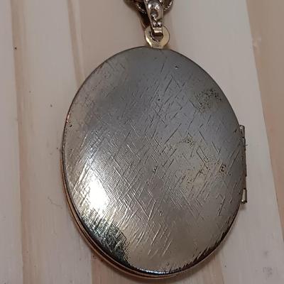 Vintage pendant necklace and a locket on a chain