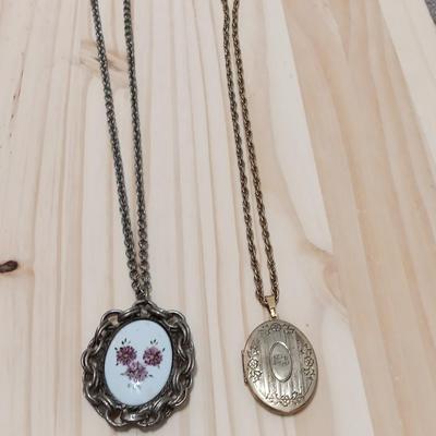 Vintage pendant necklace and a locket on a chain