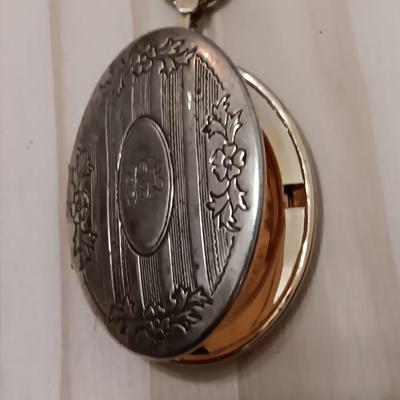 Vintage pendant necklace and a locket on a chain