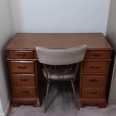 small seven drawer student desk with vintage chair