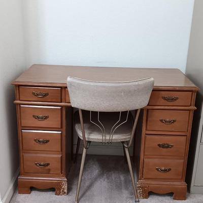 small seven drawer student desk with vintage chair