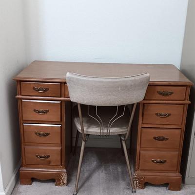 small seven drawer student desk with vintage chair