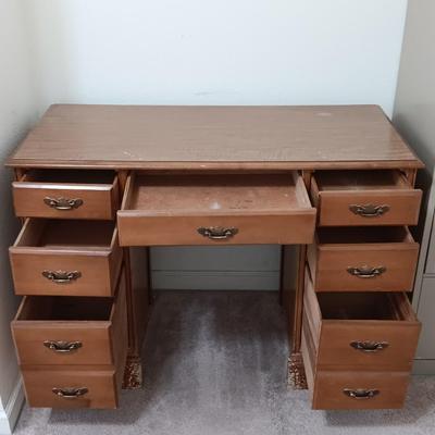 small seven drawer student desk with vintage chair
