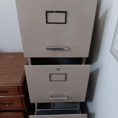 Four drawer metal filing cabinet