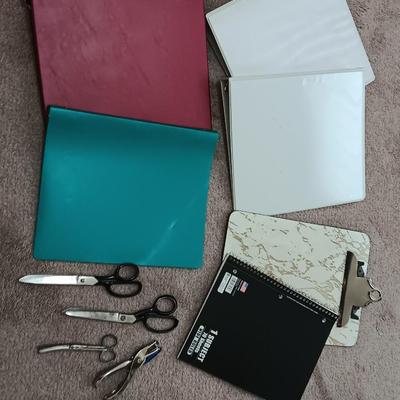 Office or school supplies - Binders - clip board - scissors - notebook - hole punch