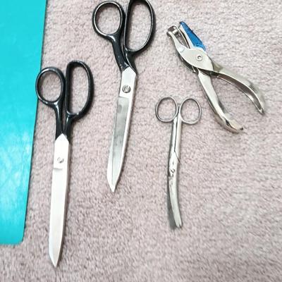 Office or school supplies - Binders - clip board - scissors - notebook - hole punch