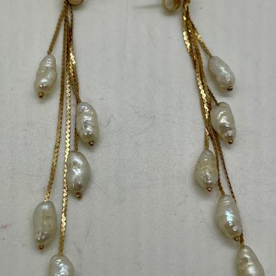 14 karat dangling earrings with natural pearls