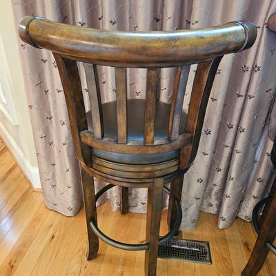 Four Howard Miller Swiveling Bar Stools (K-DW)