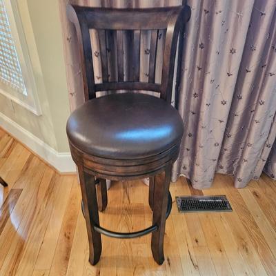 Four Howard Miller Swiveling Bar Stools (K-DW)