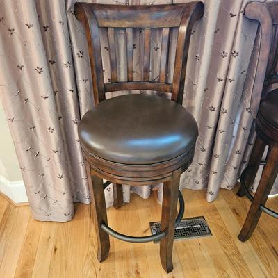 Four Howard Miller Swiveling Bar Stools (K-DW)