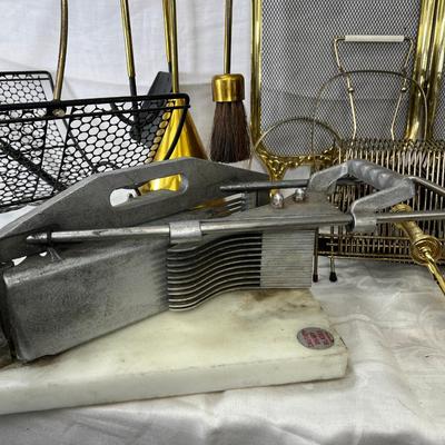 Folding gold fireplace screen racks and holders
