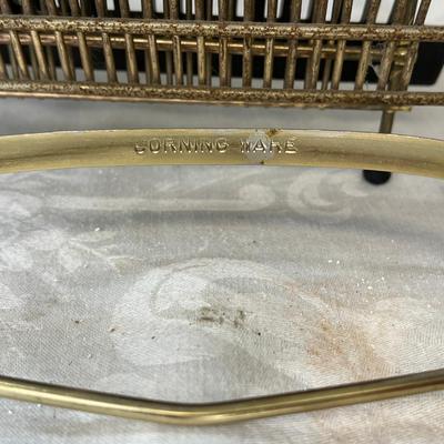 Folding gold fireplace screen racks and holders