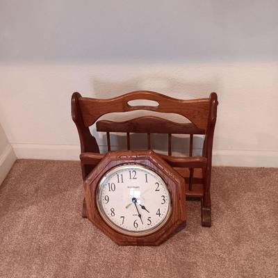 Wooden magazine rack and wood framed Ingham wall clock