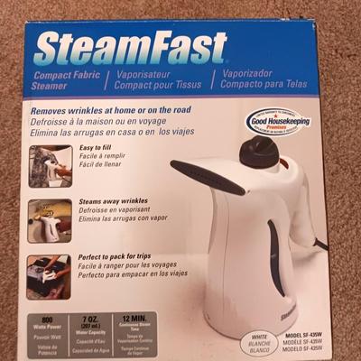 Steamfast compact fabric steamer removes wrinkles at home or on the road