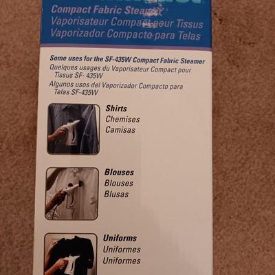 Steamfast compact fabric steamer removes wrinkles at home or on the road