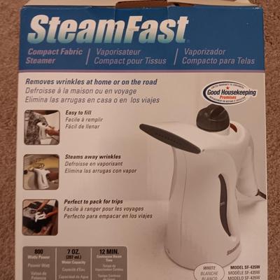 Steamfast compact fabric steamer removes wrinkles at home or on the road
