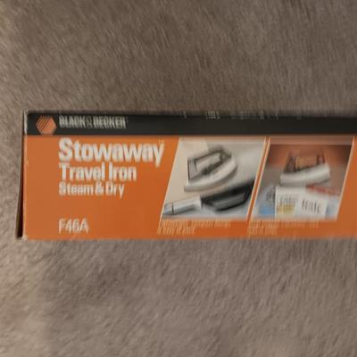 Ironing board with Black & decker stowaway travel iron