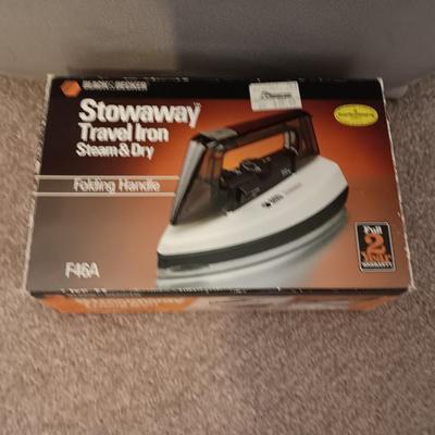 Ironing board with Black & decker stowaway travel iron