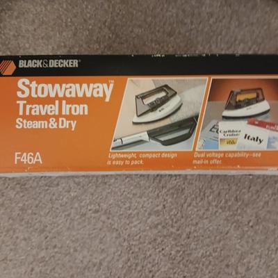 Ironing board with Black & decker stowaway travel iron