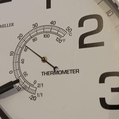 12" Howard Miller wall clock with weather station