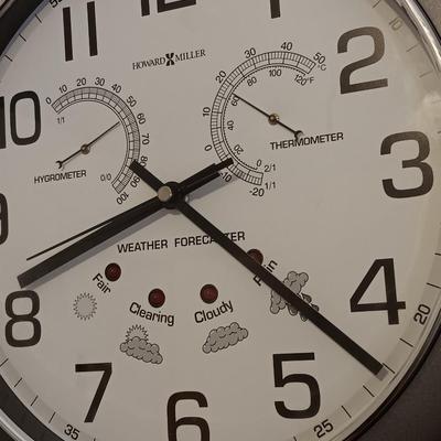 12" Howard Miller wall clock with weather station