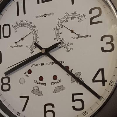 12" Howard Miller wall clock with weather station