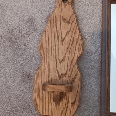Wood framed wall mirror with oak candle votive
