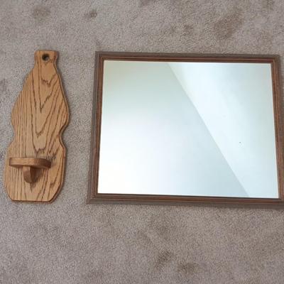 Wood framed wall mirror with oak candle votive