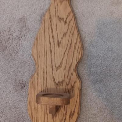 Wood framed wall mirror with oak candle votive