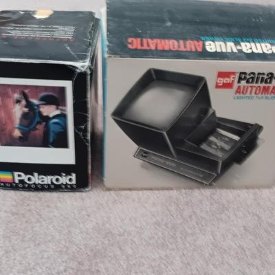 Polaroid Sun 660 Autofocus camera with original box and a Pana-Vue Automatic slide viewer