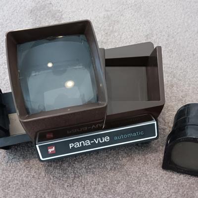 Polaroid Sun 660 Autofocus camera with original box and a Pana-Vue Automatic slide viewer