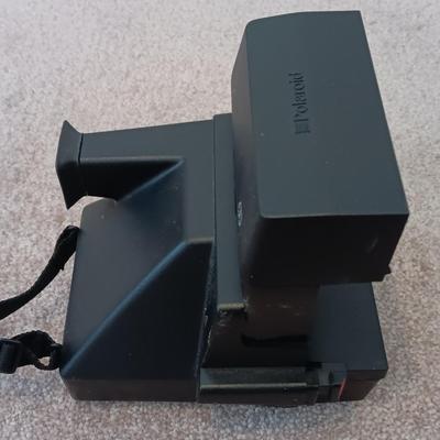 Polaroid Sun 660 Autofocus camera with original box and a Pana-Vue Automatic slide viewer