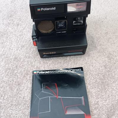 Polaroid Sun 660 Autofocus camera with original box and a Pana-Vue Automatic slide viewer