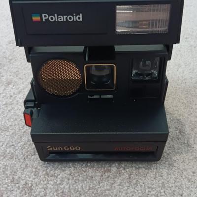 Polaroid Sun 660 Autofocus camera with original box and a Pana-Vue Automatic slide viewer