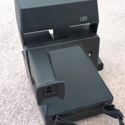 Polaroid Sun 660 Autofocus camera with original box and a Pana-Vue Automatic slide viewer