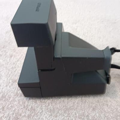 Polaroid Sun 660 Autofocus camera with original box and a Pana-Vue Automatic slide viewer