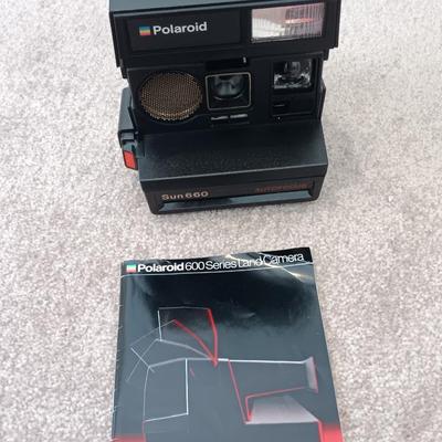 Polaroid Sun 660 Autofocus camera with original box and a Pana-Vue Automatic slide viewer