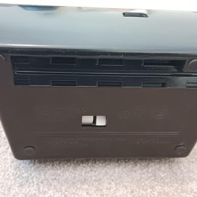 Polaroid Sun 660 Autofocus camera with original box and a Pana-Vue Automatic slide viewer
